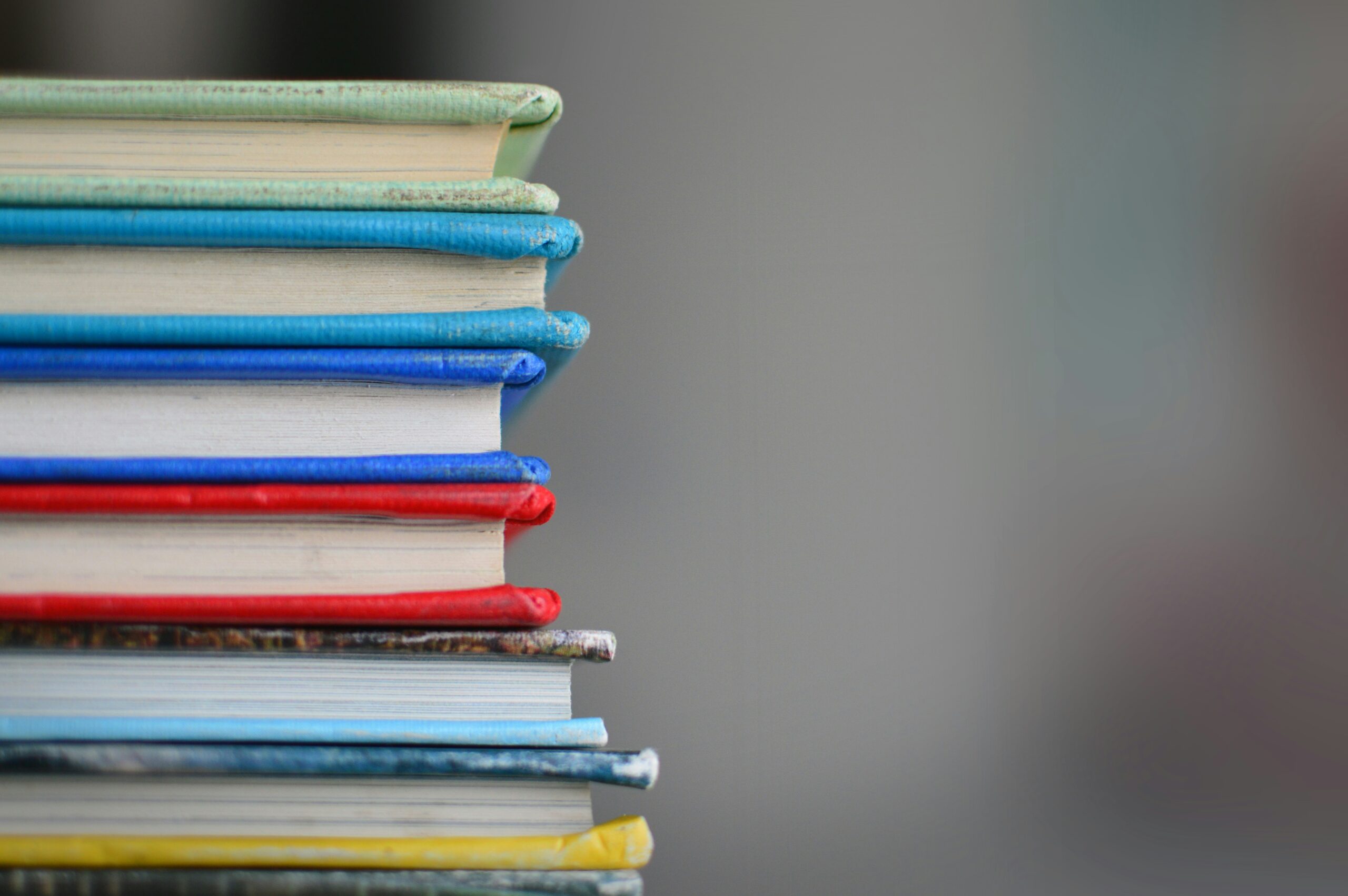 A stack of books, shown from the side